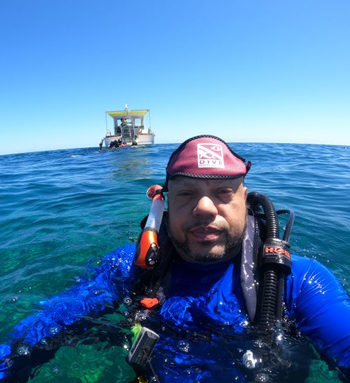 Conservation diver at the ocean surface